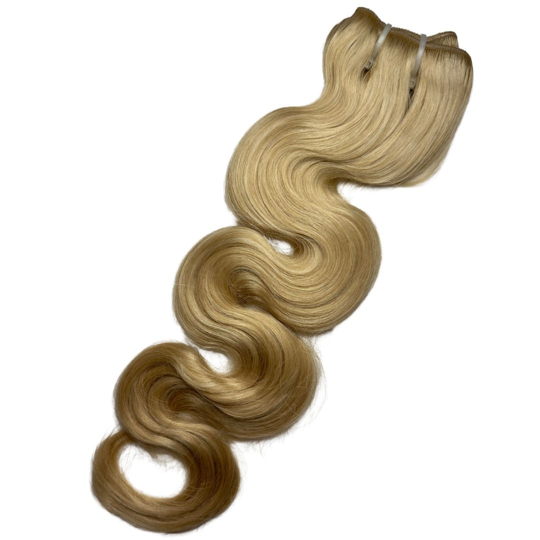 Hair Extensions - Blonde body wave hair bundle close up