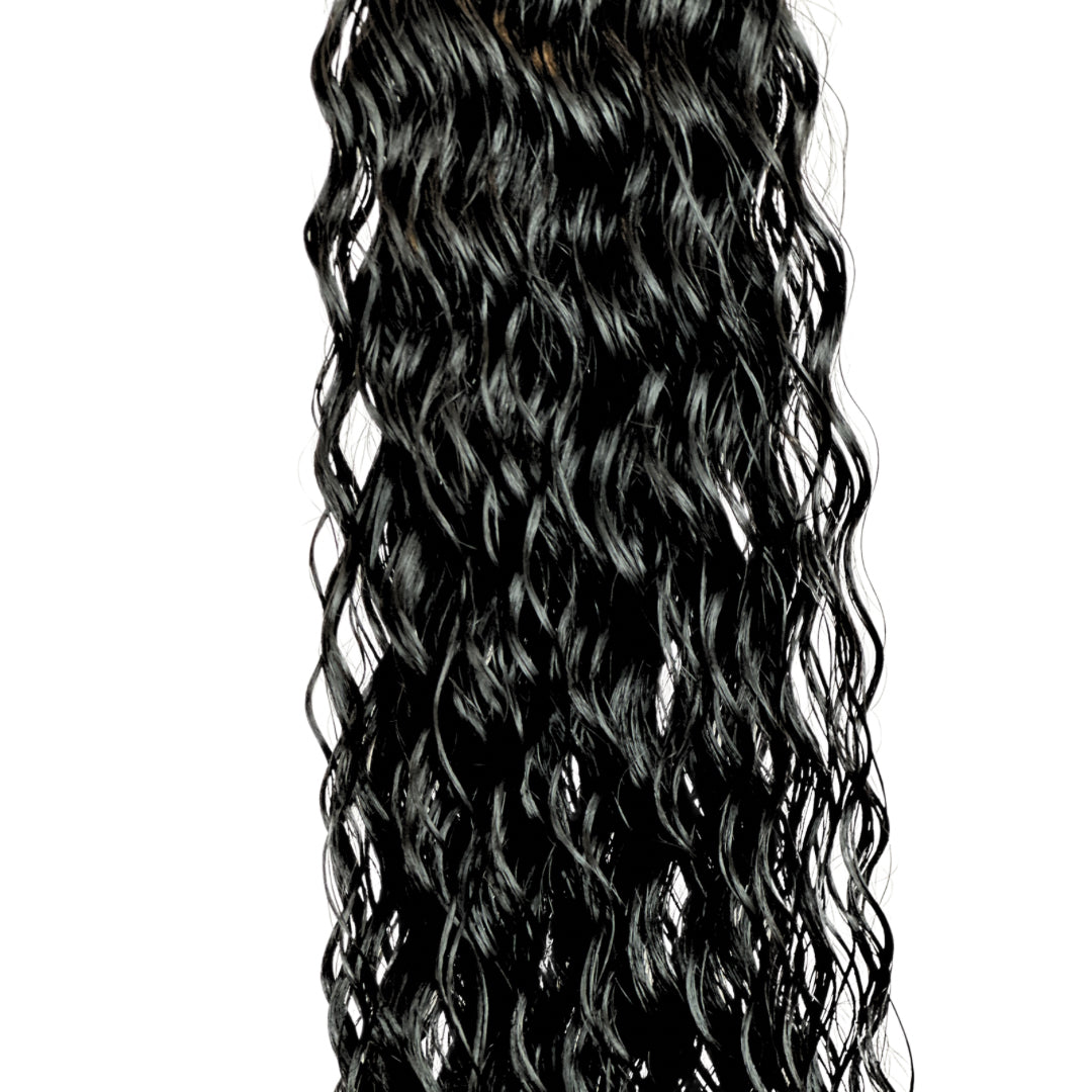 Close-up Texture of Raw Indian Curly Hair Bundle
